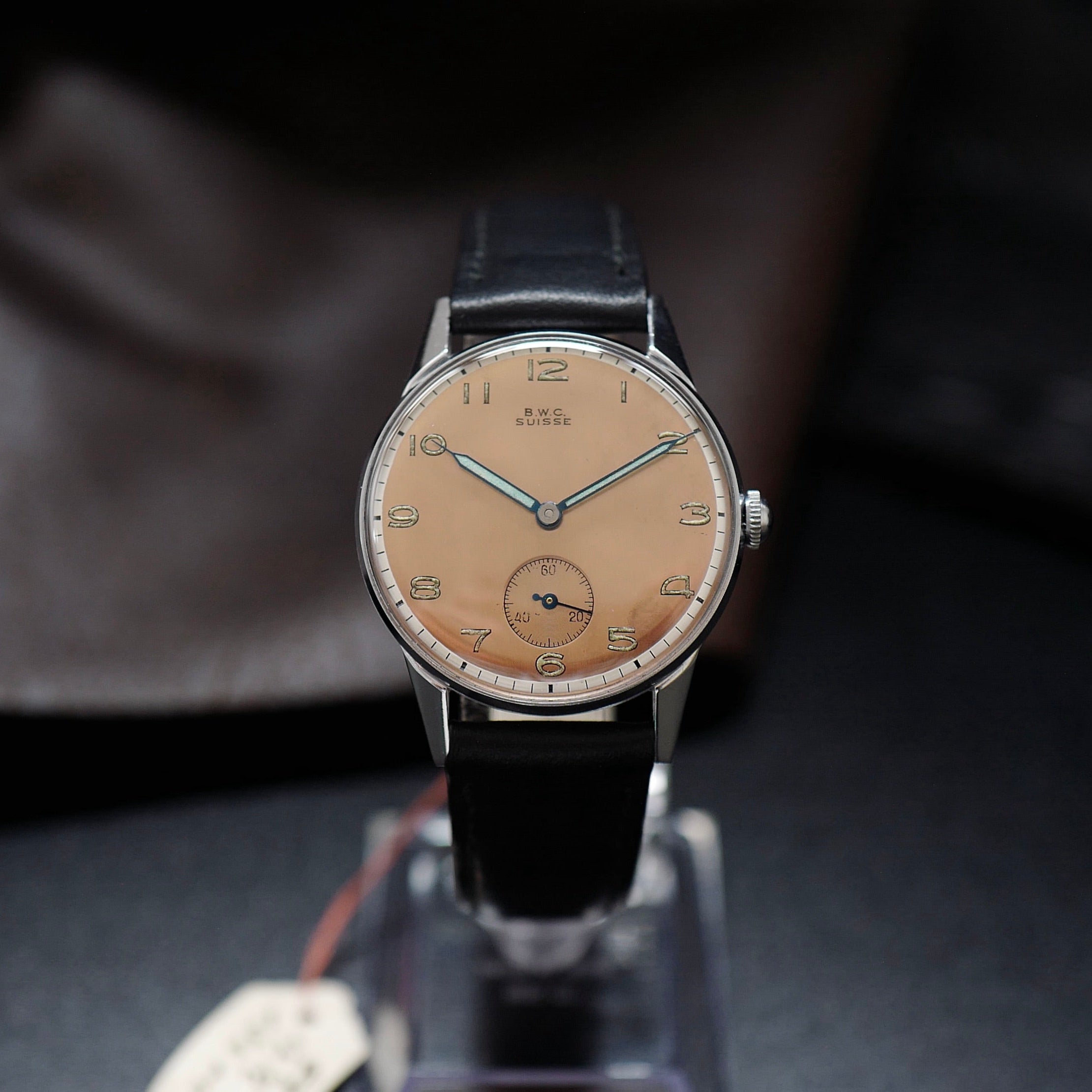 Montre BWC Buttes Watch Cie avec cadran saumon et finition bicolore des années 1950.